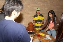 The Asian Business Students Association (ABSA) hosted a chocolate fondue Friday, January 26, 2007 before heading off to a movie premier.

Filename: SRM_20070126_1638143.jpg
Aperture: f/5.6
Shutter Speed: 1/160
Body: Canon EOS 20D
Lens: Canon EF-S 18-55mm f/3.5-5.6