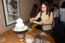 Christy Loya.  The Asian Business Students Association (ABSA) hosted a chocolate fondue Friday, January 26, 2007 before heading off to a movie premier.

Filename: SRM_20070126_1645500.jpg
Aperture: f/5.6
Shutter Speed: 1/160
Body: Canon EOS 20D
Lens: Canon EF-S 18-55mm f/3.5-5.6