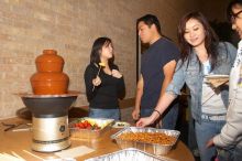 Emily Tao and Sam Houng, officers, with Jessica Cheng.  The Asian Business Students Association (ABSA) hosted a chocolate fondue Friday, January 26, 2007 before heading off to a movie premier.

Filename: SRM_20070126_1647142.jpg
Aperture: f/5.6
Shutter Speed: 1/160
Body: Canon EOS 20D
Lens: Canon EF-S 18-55mm f/3.5-5.6