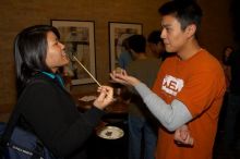 Tina Chien and Eric Chang.  The Asian Business Students Association (ABSA) hosted a chocolate fondue Friday, January 26, 2007 before heading off to a movie premier.

Filename: SRM_20070126_1657228.jpg
Aperture: f/5.6
Shutter Speed: 1/160
Body: Canon EOS 20D
Lens: Canon EF-S 18-55mm f/3.5-5.6