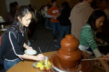 Monica Nguyen and Jacqueline So.  The Asian Business Students Association (ABSA) hosted a chocolate fondue Friday, January 26, 2007 before heading off to a movie premier.

Filename: SRM_20070126_1659362.jpg
Aperture: f/5.6
Shutter Speed: 1/160
Body: Canon EOS 20D
Lens: Canon EF-S 18-55mm f/3.5-5.6