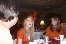 Tahnae Tarkenton eats lunch with her parents.  Kappa Kappa Gamma (KKG) hosted a parents' weekend barbecue before the UT vs Nebraska football game on Saturday, October 27, 2007 at their sorority house.

Filename: SRM_20071027_1136305.jpg
Aperture: f/5.6
Shutter Speed: 1/100
Body: Canon EOS 20D
Lens: Canon EF-S 18-55mm f/3.5-5.6