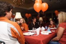 Lauren Jennings and her family enjoy BBQ at the Kappa house.  Kappa Kappa Gamma (KKG) hosted a parents' weekend barbecue before the UT vs Nebraska football game on Saturday, October 27, 2007 at their sorority house.

Filename: SRM_20071027_1140362.jpg
Aperture: f/8.0
Shutter Speed: 1/250
Body: Canon EOS 20D
Lens: Canon EF-S 18-55mm f/3.5-5.6