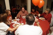 Emily Kleine and her parents, left, enjoy lunch with Liz Colquitt and her parents.  Kappa Kappa Gamma (KKG) hosted a parents' weekend barbecue before the UT vs Nebraska football game on Saturday, October 27, 2007 at their sorority house.

Filename: SRM_20071027_1143025.jpg
Aperture: f/8.0
Shutter Speed: 1/250
Body: Canon EOS 20D
Lens: Canon EF-S 18-55mm f/3.5-5.6