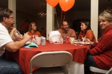 Emily Kleine and her parents, left, enjoy lunch with Liz Colquitt and her parents.  Kappa Kappa Gamma (KKG) hosted a parents' weekend barbecue before the UT vs Nebraska football game on Saturday, October 27, 2007 at their sorority house.

Filename: SRM_20071027_1143406.jpg
Aperture: f/8.0
Shutter Speed: 1/250
Body: Canon EOS 20D
Lens: Canon EF-S 18-55mm f/3.5-5.6