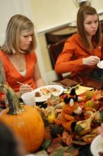 Rachel Upshaw, left, and Keaton Benn.  Kappa Kappa Gamma (KKG) hosted a parents' weekend barbecue before the UT vs Nebraska football game on Saturday, October 27, 2007 at their sorority house.

Filename: SRM_20071027_1147543.jpg
Aperture: f/1.8
Shutter Speed: 1/40
Body: Canon EOS-1D Mark II
Lens: Canon EF 50mm f/1.8 II