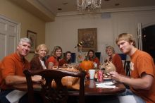 Rachel Upshaw and her family, left, and Keaton Benn, center left, and her mother, back right.  Kappa Kappa Gamma (KKG) hosted a parents' weekend barbecue before the UT vs Nebraska football game on Saturday, October 27, 2007 at their sorority house.

Filename: SRM_20071027_1148062.jpg
Aperture: f/8.0
Shutter Speed: 1/250
Body: Canon EOS 20D
Lens: Canon EF-S 18-55mm f/3.5-5.6