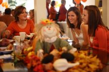 Hannah Koeijmans (in white), Madeline Koeijmans (in red), Grace Koeijmans (in brown and orange) and their parents.  Kappa Kappa Gamma (KKG) hosted a parents' weekend barbecue before the UT vs Nebraska football game on Saturday, October 27, 2007 at their so

Filename: SRM_20071027_1148287.jpg
Aperture: f/1.8
Shutter Speed: 1/50
Body: Canon EOS-1D Mark II
Lens: Canon EF 50mm f/1.8 II