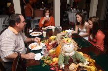 Hannah Koeijmans (in white), Madeline Koeijmans (in red), Grace Koeijmans (in brown and orange) and their parents.  Kappa Kappa Gamma (KKG) hosted a parents' weekend barbecue before the UT vs Nebraska football game on Saturday, October 27, 2007 at their so

Filename: SRM_20071027_1151263.jpg
Aperture: f/8.0
Shutter Speed: 1/250
Body: Canon EOS 20D
Lens: Canon EF-S 18-55mm f/3.5-5.6