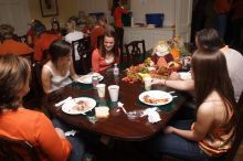 Hannah Koeijmans (in white), Madeline Koeijmans (in red), Grace Koeijmans (in brown and orange) and their parents.  Kappa Kappa Gamma (KKG) hosted a parents' weekend barbecue before the UT vs Nebraska football game on Saturday, October 27, 2007 at their so

Filename: SRM_20071027_1153004.jpg
Aperture: f/8.0
Shutter Speed: 1/250
Body: Canon EOS 20D
Lens: Canon EF-S 18-55mm f/3.5-5.6