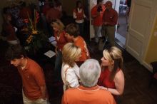 Elizabeth Clinch and her parents.  Kappa Kappa Gamma (KKG) hosted a parents' weekend barbecue before the UT vs Nebraska football game on Saturday, October 27, 2007 at their sorority house.

Filename: SRM_20071027_1155026.jpg
Aperture: f/8.0
Shutter Speed: 1/250
Body: Canon EOS 20D
Lens: Canon EF-S 18-55mm f/3.5-5.6