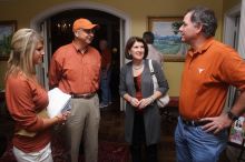 Maggie Hines and her parents.  Kappa Kappa Gamma (KKG) hosted a parents' weekend barbecue before the UT vs Nebraska football game on Saturday, October 27, 2007 at their sorority house.

Filename: SRM_20071027_1156169.jpg
Aperture: f/8.0
Shutter Speed: 1/250
Body: Canon EOS 20D
Lens: Canon EF-S 18-55mm f/3.5-5.6