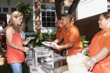 Staley Hawkins and her mom grab some barbecue.  Kappa Kappa Gamma (KKG) hosted a parents' weekend barbecue before the UT vs Nebraska football game on Saturday, October 27, 2007 at their sorority house.

Filename: SRM_20071027_1202509.jpg
Aperture: f/8.0
Shutter Speed: 1/250
Body: Canon EOS 20D
Lens: Canon EF-S 18-55mm f/3.5-5.6