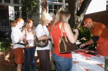 Elizabeth Clinch and her parents, right, grab some barbecue as Lindsay Nichols and her parents wait in line.  Kappa Kappa Gamma (KKG) hosted a parents' weekend barbecue before the UT vs Nebraska football game on Saturday, October 27, 2007 at their sorority

Filename: SRM_20071027_1203280.jpg
Aperture: f/8.0
Shutter Speed: 1/250
Body: Canon EOS 20D
Lens: Canon EF-S 18-55mm f/3.5-5.6