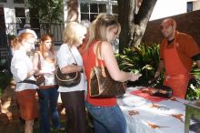 Elizabeth Clinch and her parents, right, grab some barbecue as Lindsay Nichols and her parents wait in line.  Kappa Kappa Gamma (KKG) hosted a parents' weekend barbecue before the UT vs Nebraska football game on Saturday, October 27, 2007 at their sorority

Filename: SRM_20071027_1203321.jpg
Aperture: f/8.0
Shutter Speed: 1/250
Body: Canon EOS 20D
Lens: Canon EF-S 18-55mm f/3.5-5.6