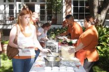 Lindsay Nichols and her parents grab some barbecue.  Kappa Kappa Gamma (KKG) hosted a parents' weekend barbecue before the UT vs Nebraska football game on Saturday, October 27, 2007 at their sorority house.

Filename: SRM_20071027_1204502.jpg
Aperture: f/8.0
Shutter Speed: 1/250
Body: Canon EOS 20D
Lens: Canon EF-S 18-55mm f/3.5-5.6