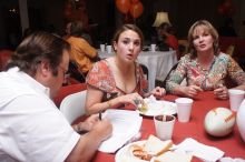 Haley Lyons and her parents sign the Kappa house leasing contract.  Kappa Kappa Gamma (KKG) hosted a parents' weekend barbecue before the UT vs Nebraska football game on Saturday, October 27, 2007 at their sorority house.

Filename: SRM_20071027_1205243.jpg
Aperture: f/8.0
Shutter Speed: 1/250
Body: Canon EOS 20D
Lens: Canon EF-S 18-55mm f/3.5-5.6