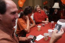 Liz Colquitt and family share old photographs.  Kappa Kappa Gamma (KKG) hosted a parents' weekend barbecue before the UT vs Nebraska football game on Saturday, October 27, 2007 at their sorority house.

Filename: SRM_20071027_1207200.jpg
Aperture: f/8.0
Shutter Speed: 1/250
Body: Canon EOS 20D
Lens: Canon EF-S 18-55mm f/3.5-5.6