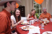 Jill Swanson and her brother, left, with Elizabeth Clinch, right.  Kappa Kappa Gamma (KKG) hosted a parents' weekend barbecue before the UT vs Nebraska football game on Saturday, October 27, 2007 at their sorority house.

Filename: SRM_20071027_1210142.jpg
Aperture: f/8.0
Shutter Speed: 1/250
Body: Canon EOS 20D
Lens: Canon EF-S 18-55mm f/3.5-5.6