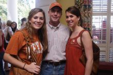 Sisters Allison and Mary Stewart Anderson, both Kappas, with their father.  Kappa Kappa Gamma (KKG) hosted a parents' weekend barbecue before the UT vs Nebraska football game on Saturday, October 27, 2007 at their sorority house.

Filename: SRM_20071027_1239063.jpg
Aperture: f/8.0
Shutter Speed: 1/30
Body: Canon EOS 20D
Lens: Canon EF-S 18-55mm f/3.5-5.6