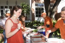 Sisters Allison and Mary Stewart Anderson, both Kappas, with their father.  Kappa Kappa Gamma (KKG) hosted a parents' weekend barbecue before the UT vs Nebraska football game on Saturday, October 27, 2007 at their sorority house.

Filename: SRM_20071027_1245403.jpg
Aperture: f/8.0
Shutter Speed: 1/250
Body: Canon EOS 20D
Lens: Canon EF-S 18-55mm f/3.5-5.6