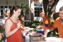 Sisters Allison and Mary Stewart Anderson, both Kappas, with their father.  Kappa Kappa Gamma (KKG) hosted a parents' weekend barbecue before the UT vs Nebraska football game on Saturday, October 27, 2007 at their sorority house.

Filename: SRM_20071027_1245403.jpg
Aperture: f/8.0
Shutter Speed: 1/250
Body: Canon EOS 20D
Lens: Canon EF-S 18-55mm f/3.5-5.6