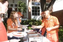 Sisters Allison and Mary Stewart Anderson, both Kappas, with their father.  Kappa Kappa Gamma (KKG) hosted a parents' weekend barbecue before the UT vs Nebraska football game on Saturday, October 27, 2007 at their sorority house.

Filename: SRM_20071027_1245505.jpg
Aperture: f/8.0
Shutter Speed: 1/250
Body: Canon EOS 20D
Lens: Canon EF-S 18-55mm f/3.5-5.6