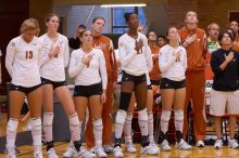 UT senior Jen Christian (#13, OH), UT freshman Jennifer Doris (#8, UTIL), UT freshman Chelsey Klein (#9, DS), UT sophomore Destinee Hooker (#21, OH), and UT junior Kiley Hall (#11, DS/L) pause for the national anthem before the game.  The Longhorns defeate

Filename: SRM_20071024_1832449.jpg
Aperture: f/5.0
Shutter Speed: 1/200
Body: Canon EOS-1D Mark II
Lens: Canon EF 80-200mm f/2.8 L