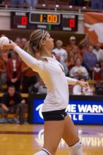 UT senior Michelle Moriarty (#4, S) throws a plastic volleyball into the crowd before the game.  The Longhorns defeated the Huskers 3-0 on Wednesday night, October 24, 2007 at Gregory Gym.

Filename: SRM_20071024_1834528.jpg
Aperture: f/4.5
Shutter Speed: 1/400
Body: Canon EOS-1D Mark II
Lens: Canon EF 80-200mm f/2.8 L