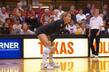 UT senior Alyson Jennings (#16, L) waits for the break in the action to end.  The Longhorns defeated the Huskers 3-0 on Wednesday night, October 24, 2007 at Gregory Gym.

Filename: SRM_20071024_1845004.jpg
Aperture: f/4.0
Shutter Speed: 1/400
Body: Canon EOS-1D Mark II
Lens: Canon EF 80-200mm f/2.8 L