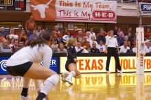 UT senior Alyson Jennings (#16, L) hits the ball wrong as UT freshman Juliann Faucette (#1, OH) watches.  The Longhorns defeated the Huskers 3-0 on Wednesday night, October 24, 2007 at Gregory Gym.

Filename: SRM_20071024_1845045.jpg
Aperture: f/4.0
Shutter Speed: 1/400
Body: Canon EOS-1D Mark II
Lens: Canon EF 80-200mm f/2.8 L