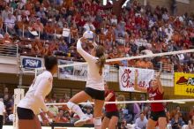 UT senior Michelle Moriarty (#4, S) sets the ball as UT senior Brandy Magee (#44, MB), Nebraska sophomore Kori Cooper (#15, MB), and Nebraska senior Sarah Pavan (#9, RS) watch.  The Longhorns defeated the Huskers 3-0 on Wednesday night, October 24, 2007 at

Filename: SRM_20071024_1845269.jpg
Aperture: f/4.0
Shutter Speed: 1/400
Body: Canon EOS-1D Mark II
Lens: Canon EF 80-200mm f/2.8 L