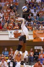 UT sophomore Destinee Hooker (#21, OH) floats in the air, waiting to spike the ball.  The Longhorns defeated the Huskers 3-0 on Wednesday night, October 24, 2007 at Gregory Gym.

Filename: SRM_20071024_1850227.jpg
Aperture: f/4.0
Shutter Speed: 1/400
Body: Canon EOS-1D Mark II
Lens: Canon EF 80-200mm f/2.8 L
