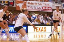 UT sophomore Heather Kisner (#19, DS) hits the ball as UT sophomore Ashley Engle (#10, S/RS), UT senior Alyson Jennings (#16, L), and UT junior Lauren Paolini (#3, UTIL) watch.  The Longhorns defeated the Huskers 3-0 on Wednesday night, October 24, 2007 at

Filename: SRM_20071024_1851385.jpg
Aperture: f/4.0
Shutter Speed: 1/400
Body: Canon EOS-1D Mark II
Lens: Canon EF 80-200mm f/2.8 L