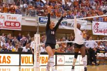 UT senior Alyson Jennings (#16, L) and UT sophomore Destinee Hooker (#21, OH) celebrate after a point.  The Longhorns defeated the Huskers 3-0 on Wednesday night, October 24, 2007 at Gregory Gym.

Filename: SRM_20071024_1857100.jpg
Aperture: f/4.0
Shutter Speed: 1/320
Body: Canon EOS-1D Mark II
Lens: Canon EF 80-200mm f/2.8 L
