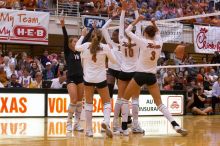 UT senior Alyson Jennings (#16, L), UT senior Michelle Moriarty (#4, S), UT sophomore Destinee Hooker (#21, OH), UT sophomore Ashley Engle (#10, S/RS), and UT junior Lauren Paolini (#3, UTIL) watch.  The Longhorns defeated the Huskers 3-0 on Wednesday nigh

Filename: SRM_20071024_1901323.jpg
Aperture: f/4.0
Shutter Speed: 1/400
Body: Canon EOS-1D Mark II
Lens: Canon EF 80-200mm f/2.8 L