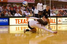 UT freshman Juliann Faucette (#1, OH) misses the ball as UT senior Alyson Jennings (#16, L) and UT sophomore Destinee Hooker (#21, OH) watch.  The Longhorns defeated the Huskers 3-0 on Wednesday night, October 24, 2007 at Gregory Gym.

Filename: SRM_20071024_1901589.jpg
Aperture: f/4.0
Shutter Speed: 1/400
Body: Canon EOS-1D Mark II
Lens: Canon EF 80-200mm f/2.8 L