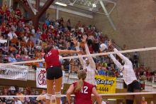 UT senior Brandy Magee (#44, MB) and UT sophomore Destinee Hooker (#21, OH) attempt to block a spike from Nebraska sophomore Kori Cooper (#15, MB) as Nebraska sophomore Rachel Holloway (#12, S) watches.  The Longhorns defeated the Huskers 3-0 on Wednesday

Filename: SRM_20071024_1910128.jpg
Aperture: f/4.0
Shutter Speed: 1/400
Body: Canon EOS-1D Mark II
Lens: Canon EF 80-200mm f/2.8 L