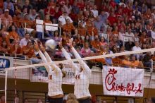 UT sophomore Ashley Engle (#10, S/RS) and UT senior Brandy Magee (#44, MB) attempt to block the ball.  The Longhorns defeated the Huskers 3-0 on Wednesday night, October 24, 2007 at Gregory Gym.

Filename: SRM_20071024_1911243.jpg
Aperture: f/4.0
Shutter Speed: 1/400
Body: Canon EOS-1D Mark II
Lens: Canon EF 80-200mm f/2.8 L