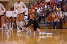 UT senior Alyson Jennings (#16, L) waits for the ball as UT freshman Juliann Faucette (#1, OH) watches, with UT freshman Chelsey Klein (#9, DS) and UT junior Lauren Paolini (#3, UTIL) watching from the sideline.  The Longhorns defeated the Huskers 3-0 on W

Filename: SRM_20071024_1913047.jpg
Aperture: f/4.0
Shutter Speed: 1/400
Body: Canon EOS-1D Mark II
Lens: Canon EF 80-200mm f/2.8 L