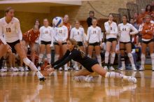 UT senior Alyson Jennings (#16, L) dives for the ball as UT sophomore Ashley Engle (#10, S/RS) watches from on the court, and UT freshman Jennifer Doris (#8, UTIL), UT freshman Chelsey Klein (#9, DS), UT junior Kiley Hall (#11, DS/L), UT freshman Alexandra

Filename: SRM_20071024_1913501.jpg
Aperture: f/4.0
Shutter Speed: 1/400
Body: Canon EOS-1D Mark II
Lens: Canon EF 80-200mm f/2.8 L