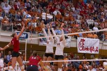 UT sophomore Ashley Engle (#10, S/RS) and UT senior Brandy Magee (#44, MB) block a hit by Nebraska senior Christina Houghtelling (#3, OH) as Nebraska sophomore Kori Cooper (#15, MB) watches.  The Longhorns defeated the Huskers 3-0 on Wednesday night, Octob

Filename: SRM_20071024_1919322.jpg
Aperture: f/4.0
Shutter Speed: 1/400
Body: Canon EOS-1D Mark II
Lens: Canon EF 80-200mm f/2.8 L