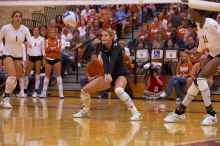 UT senior Alyson Jennings (#16, L) hits the ball as UT sophomore Destinee Hooker (#21, OH) and UT freshman Juliann Faucette (#1, OH) watch.  The Longhorns defeated the Huskers 3-0 on Wednesday night, October 24, 2007 at Gregory Gym.

Filename: SRM_20071024_1919525.jpg
Aperture: f/4.0
Shutter Speed: 1/400
Body: Canon EOS-1D Mark II
Lens: Canon EF 80-200mm f/2.8 L