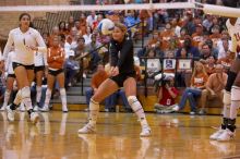 UT senior Alyson Jennings (#16, L) hits the ball as UT sophomore Destinee Hooker (#21, OH) and UT freshman Juliann Faucette (#1, OH) watch.  The Longhorns defeated the Huskers 3-0 on Wednesday night, October 24, 2007 at Gregory Gym.

Filename: SRM_20071024_1919546.jpg
Aperture: f/4.0
Shutter Speed: 1/400
Body: Canon EOS-1D Mark II
Lens: Canon EF 80-200mm f/2.8 L