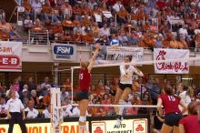 UT junior Lauren Paolini (#3, UTIL) spikes the ball as Nebraska junior Jordan Larson (#10, OH) attempts to block it and Nebraska sophomore Kori Cooper (#15, MB) watches.  The Longhorns defeated the Huskers 3-0 on Wednesday night, October 24, 2007 at Gregor

Filename: SRM_20071024_1924384.jpg
Aperture: f/4.0
Shutter Speed: 1/400
Body: Canon EOS-1D Mark II
Lens: Canon EF 80-200mm f/2.8 L