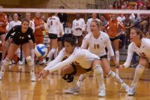 UT senior Alyson Jennings (#16, L) watches intently as UT senior Brandy Magee (#44, MB) hits the ball with UT sophomore Heather Kisner (#19, DS) and UT sophomore Ashley Engle (#10, S/RS) watching over her shoulder.  The Longhorns defeated the Huskers 3-0 o

Filename: SRM_20071024_1925564.jpg
Aperture: f/4.0
Shutter Speed: 1/400
Body: Canon EOS-1D Mark II
Lens: Canon EF 80-200mm f/2.8 L