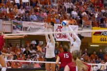 UT senior Michelle Moriarty (#4, S) and UT senior Brandy Magee (#44, MB) block a spike by Nebraska junior Jordan Larson (#10, OH) as Nebraska sophomore Kori Cooper (#15, MB) and Nebraska sophomore Rachel Holloway (#12, S) watch.  The Longhorns defeated the

Filename: SRM_20071024_1926104.jpg
Aperture: f/4.0
Shutter Speed: 1/400
Body: Canon EOS-1D Mark II
Lens: Canon EF 80-200mm f/2.8 L