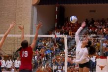 UT freshman Juliann Faucette (#1, OH) spikes as Nebraska freshman Tara Mueller (#19, OH) attempts to block.  The Longhorns defeated the Huskers 3-0 on Wednesday night, October 24, 2007 at Gregory Gym.

Filename: SRM_20071024_1927080.jpg
Aperture: f/4.0
Shutter Speed: 1/400
Body: Canon EOS-1D Mark II
Lens: Canon EF 80-200mm f/2.8 L