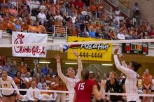 UT senior Michelle Moriarty (#4, S) sets the ball for UT sophomore Ashley Engle (#10, S/RS) as UT senior Alyson Jennings (#16, L), UT senior Brandy Magee (#44, MB) and Nebraska sophomore Kori Cooper (#15, MB) watch.  The Longhorns defeated the Huskers 3-0

Filename: SRM_20071024_1928102.jpg
Aperture: f/4.0
Shutter Speed: 1/400
Body: Canon EOS-1D Mark II
Lens: Canon EF 80-200mm f/2.8 L