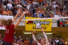 UT sophomore Ashley Engle (#10, S/RS) sets the ball as Nebraska senior Tracy Stalls (#11, MB) prematurely attempts to block.  The Longhorns defeated the Huskers 3-0 on Wednesday night, October 24, 2007 at Gregory Gym.

Filename: SRM_20071024_1929105.jpg
Aperture: f/4.0
Shutter Speed: 1/400
Body: Canon EOS-1D Mark II
Lens: Canon EF 80-200mm f/2.8 L